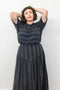 Izzy Top, Black